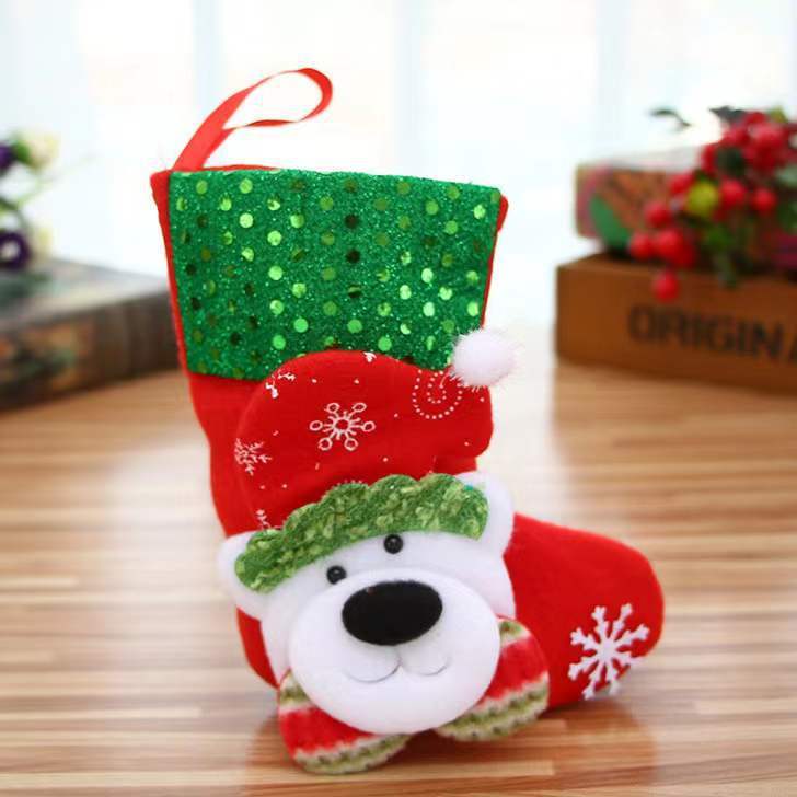 Santa, Reindeer, Snowman, and Polar Bear stockings along with decorative gnomes